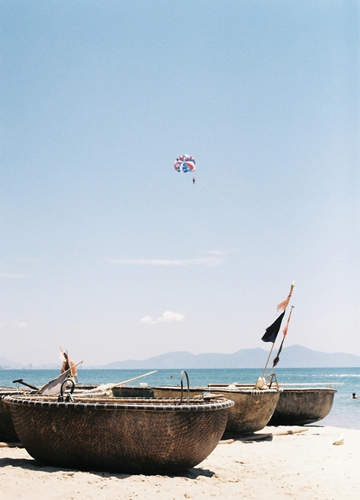 Bateaux sur une plage du Vietnam